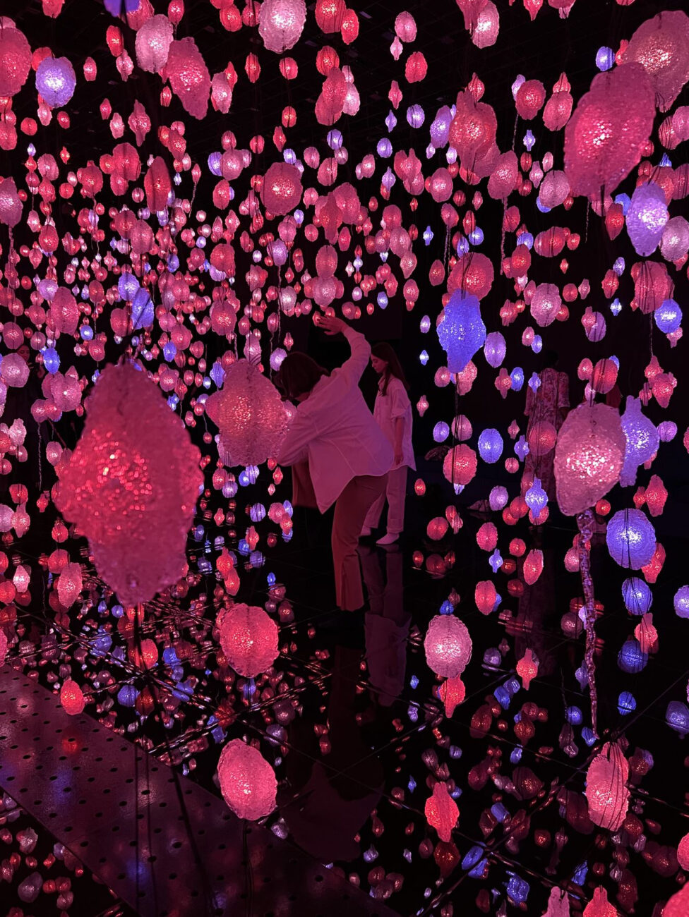 Tatiana and her sister, Giuliana, improvising in the middle of an immersive lights installation by Pipilotti Rist titled Your Brain to Me, My Brain to You at the Qatar National Museum.