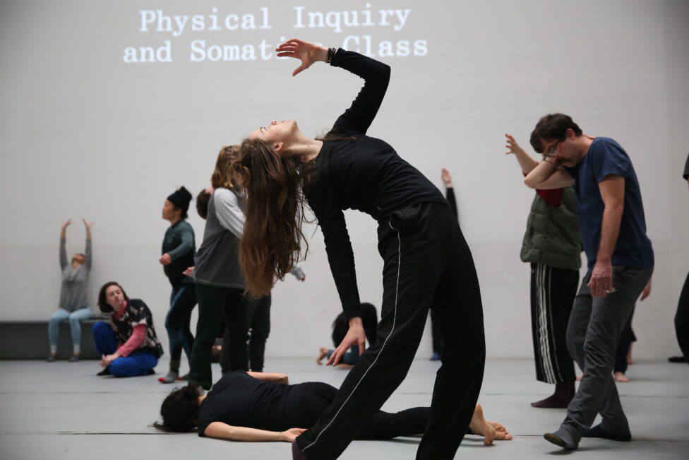 A dancer leans back with their hand above their head, others in various shapes around them. 2019, MR@MoMA. iele paloumpis and Jaime Ortega. Photo by Paula Court.