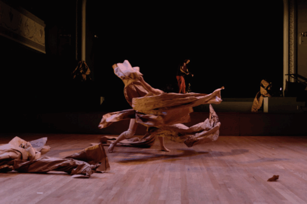 Dancers swirling around in fabric on a stage, by Ryutaro Mishima (Headless Wolf), Nami Yamamoto, Matt Acheson and Idol in Headless Wolf