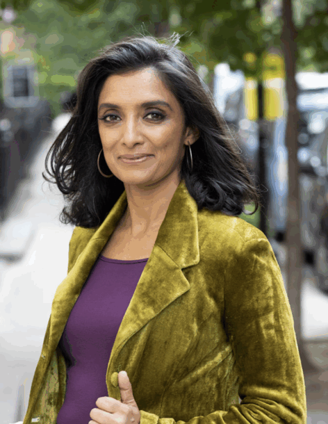 Preeti smiles towards the camera.