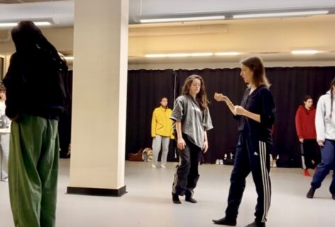 A group of dancers more through the space in a dance studio. Photo courtesy of the artist.