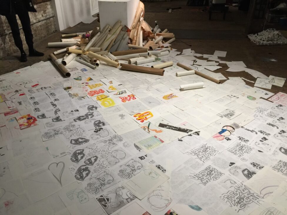 Detail photo of drawings on the space's ground. Various drawings such as hearts and nondescript shapes are sketched in marker and pencil. Atlantic Terminus by Jon Kinzel at Invisible Dog in 2016